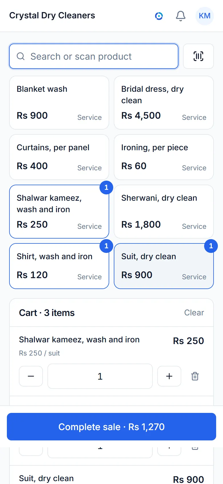 The sale screen of a sample laundry and dry cleaning business, with its items and a bill.